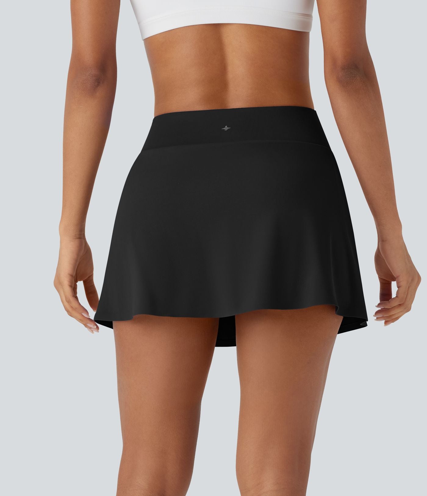 Jupe de tennis mini 2-en-1 à taille haute, fente, blocs de couleur et poche latérale