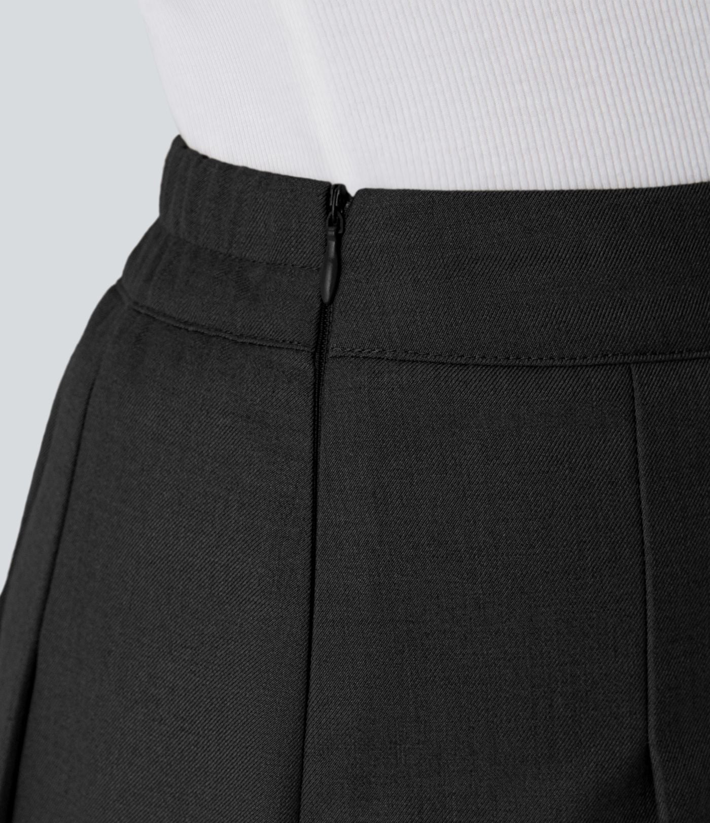 Mini-jupe plissée taille haute 2-en-1 avec fermeture éclair invisible