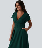 Robe midi à manches courtes chauve-souris et col en V avec poches