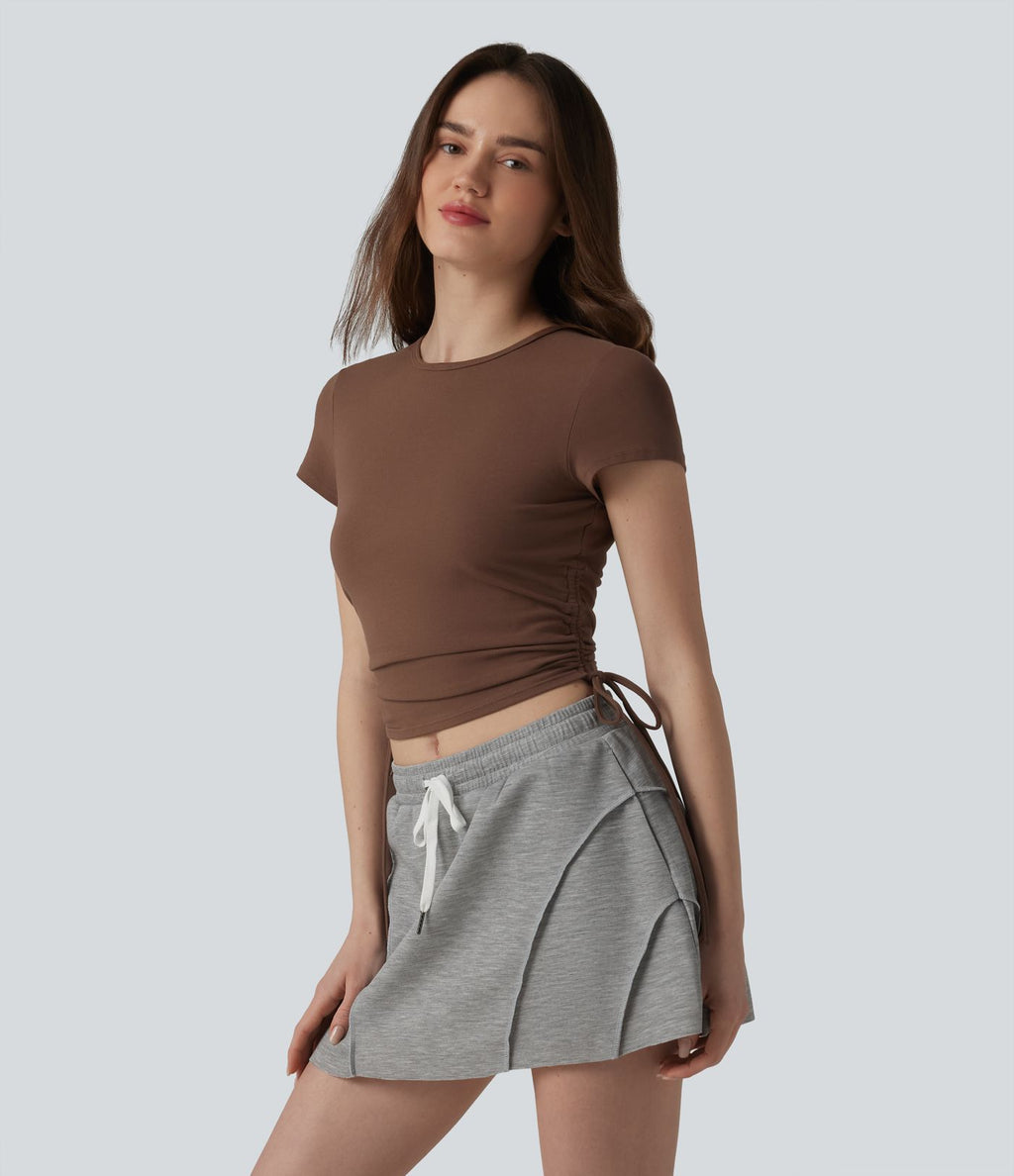 Halara T-shirt décontracté en jersey de coton à col rond, cordon de serrage, dos froncé et ouverture goutte