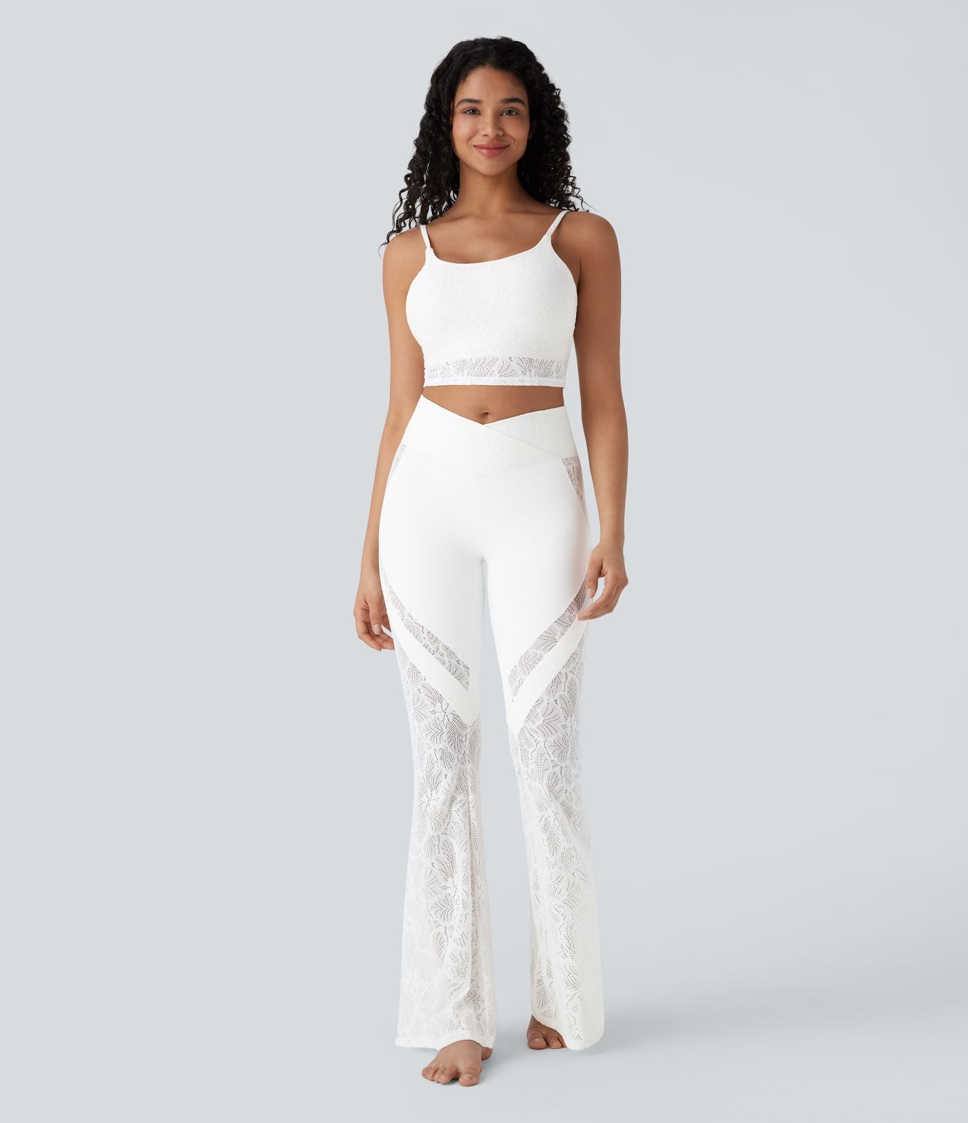 Pantalon de yoga évasé à taille haute croisée, poche arrière et dentelle