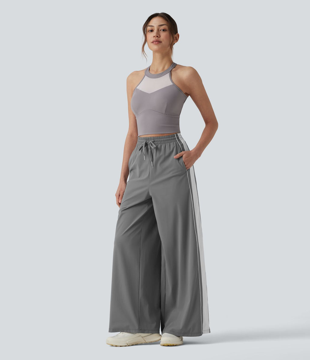 Pantalon running large à rayures taille haute avec cordon de serrage, séchage rapide et effet frais InstantCool avec poches, protection solaire UPF40+