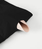 Robe maxi grande taille à col halter avec brassière intégrée, lien noué au dos et poches