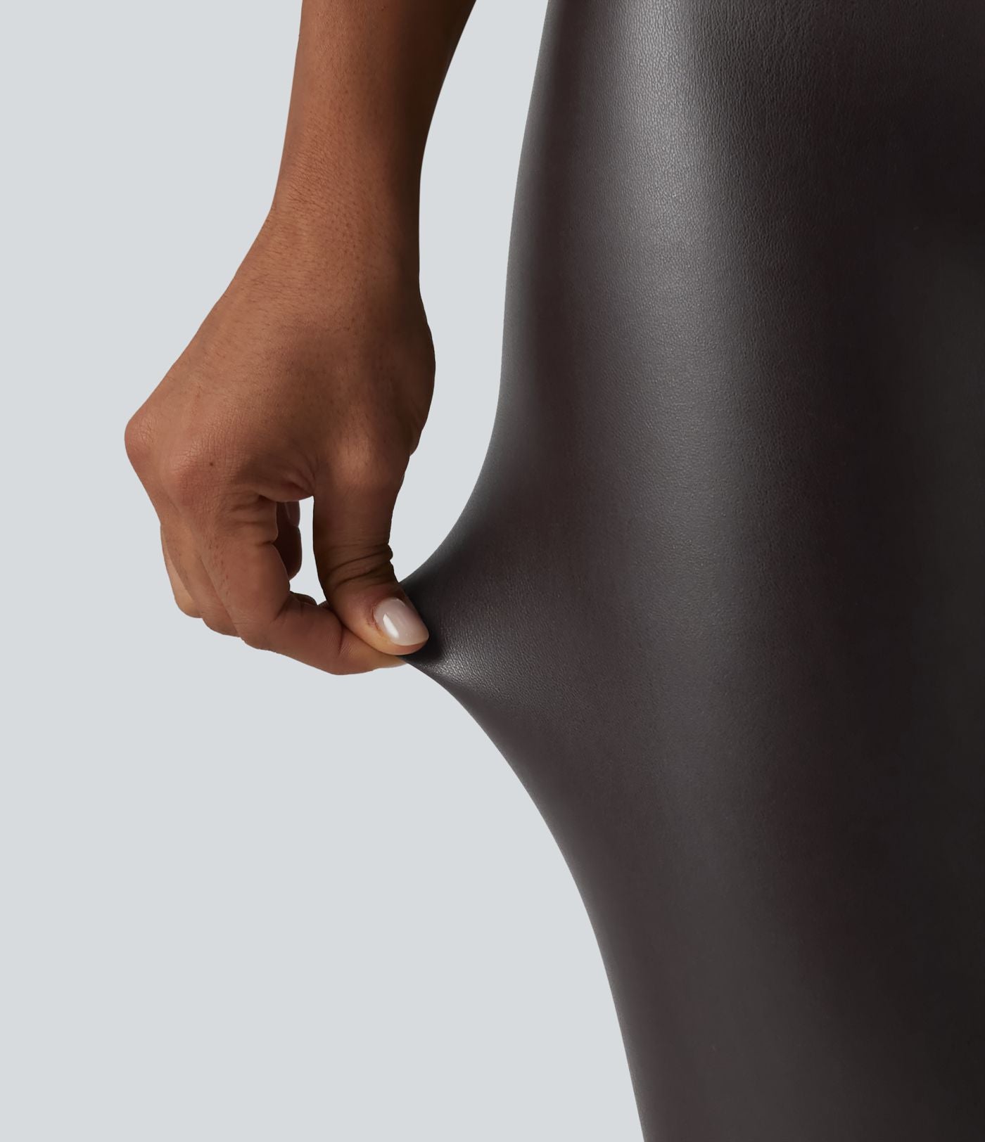Legging corsaire taille haute ventre plat en similicuir extensible avec poches