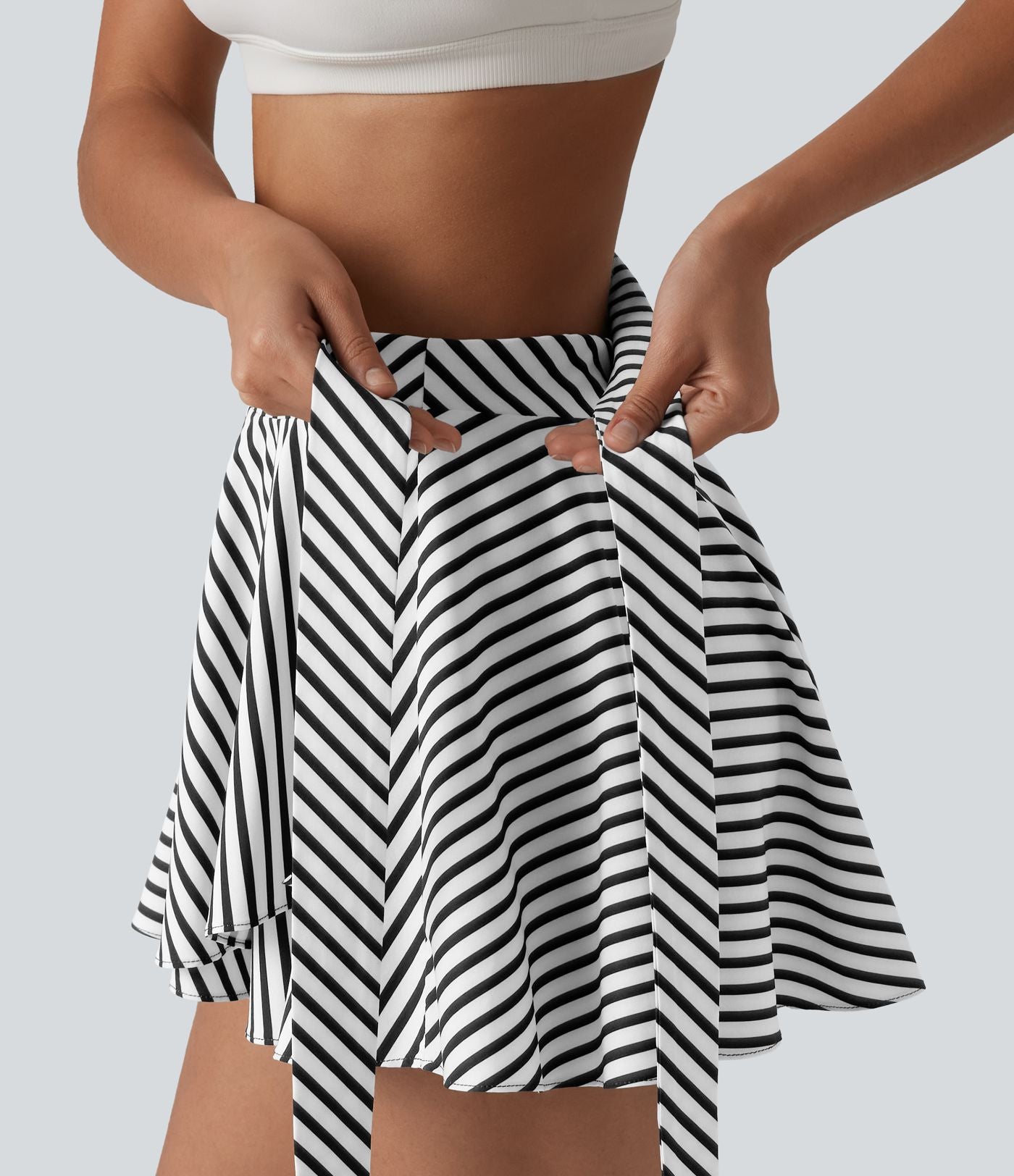 Jupe tennis mini fluide 2-en-1 taille haute imprimé léopard avec liens latéraux et poche