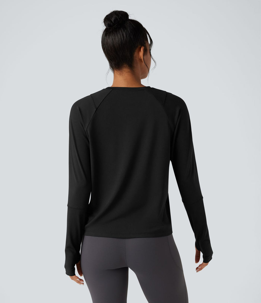 Top de sport running manches longues à découpes avec trous pouces
