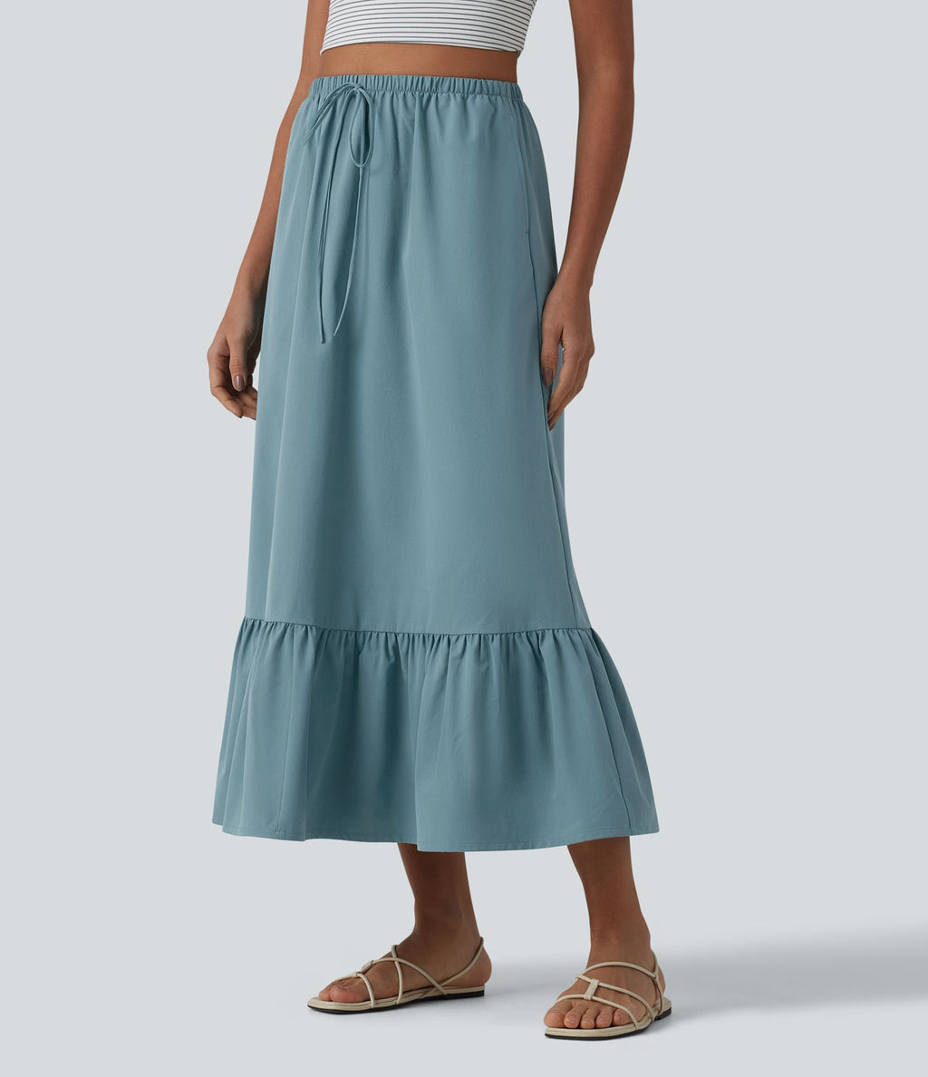 Jupe casual mi-longue évasée en popeline stretch taille haute avec cordon de serrage, ourlet volanté et poches