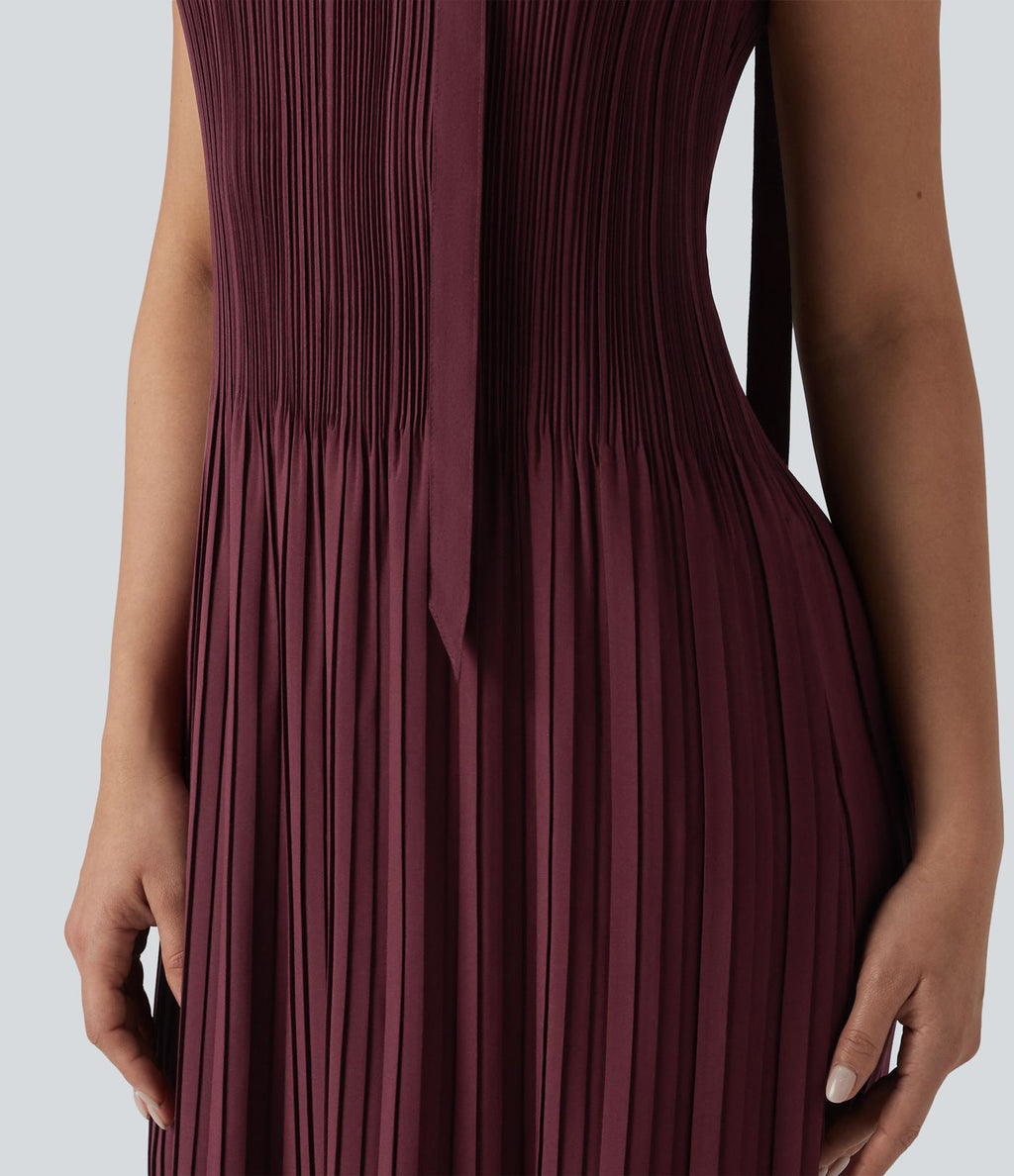 Robe mi-longue de travail ceinturée col bateau sans manches plissée