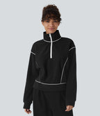 Sweat bicolore en polaire col montant avec demi-zip et manches longues