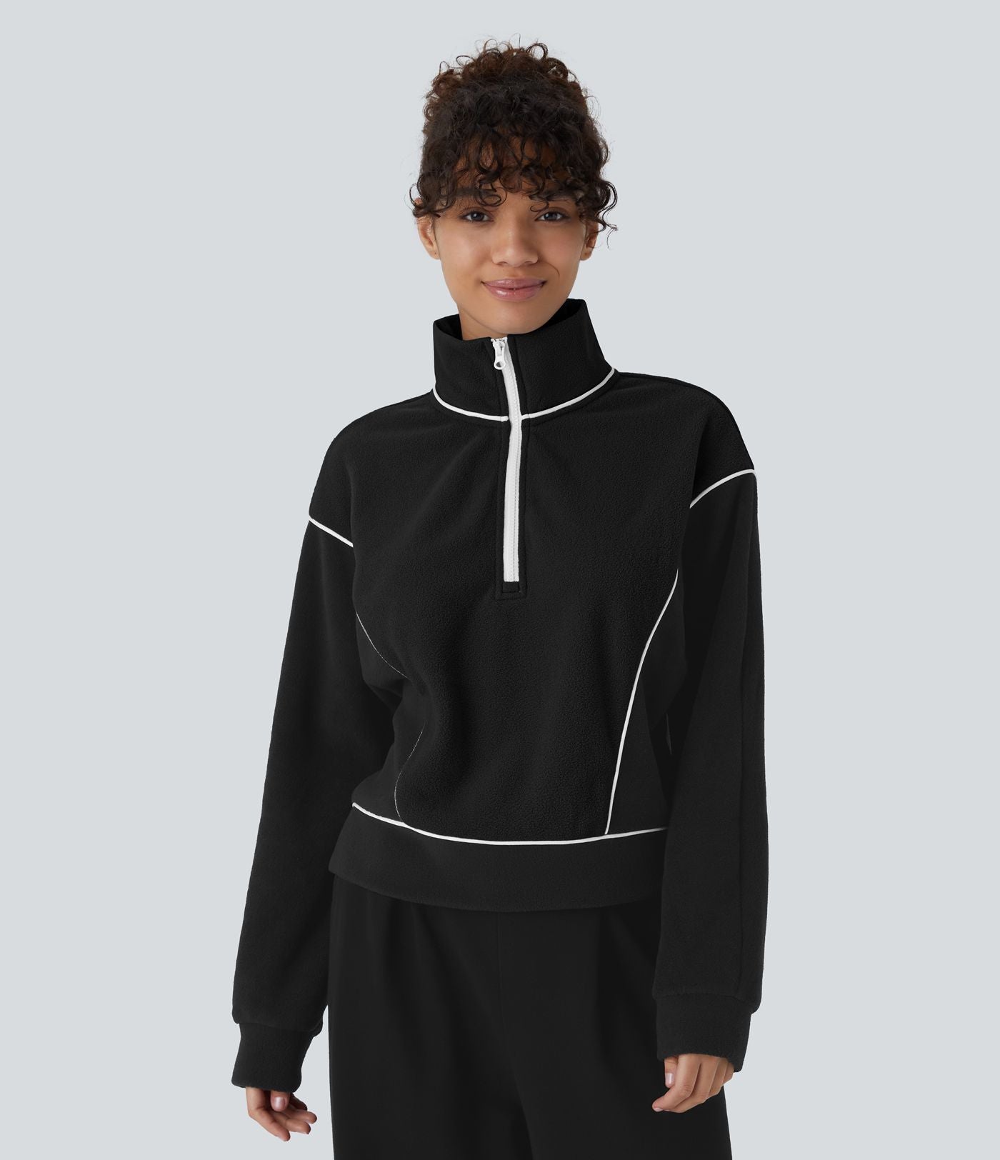 Sweat bicolore en polaire col montant avec demi-zip et manches longues