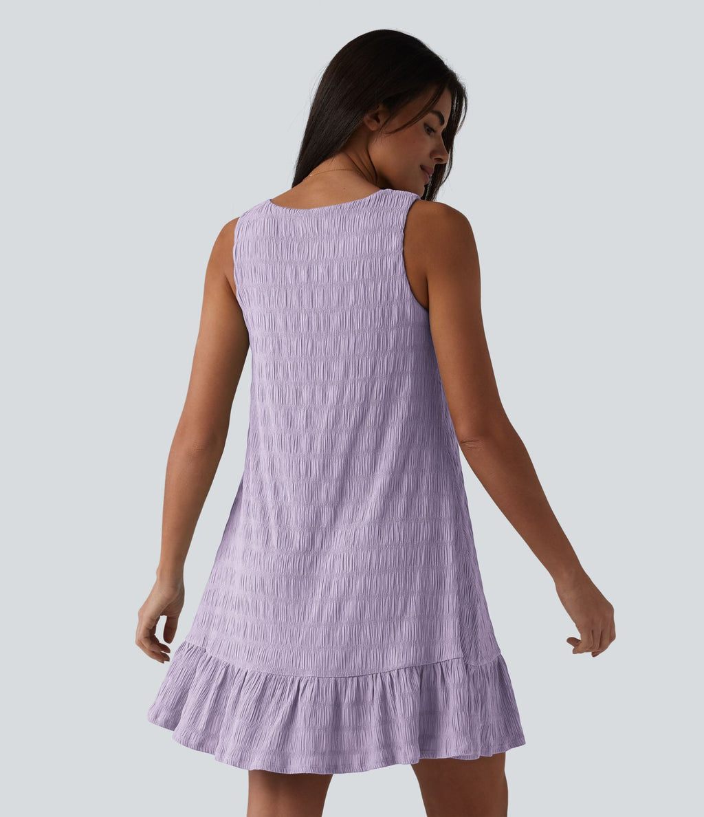 Robe courte décontractée sans manches à col rond, soutien-gorge intégré et ourlet à volants