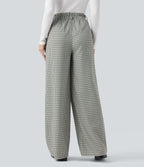 Pantalon tailleur ample taille haute à carreaux avec poches