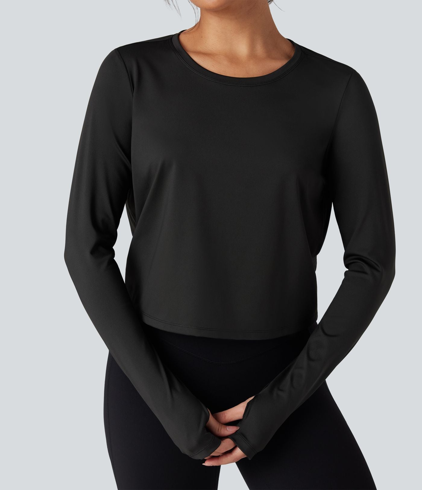 Top de sport yoga col rond manches longues mesh contrastant à découpes liens dans le dos avec trous pouces