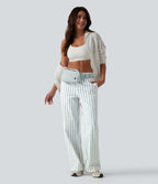 Pantalon de tennis rayé à taille mi-haute et jambes droites avec poches