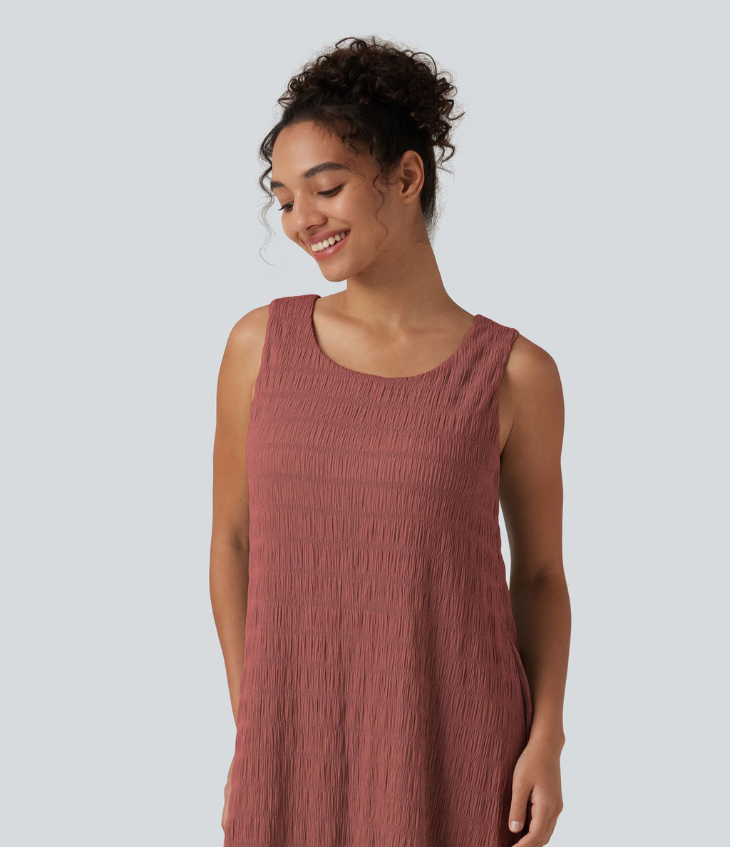 Robe midi sans manches à encolure arrondie avec coussinets amovibles et ourlet à volants