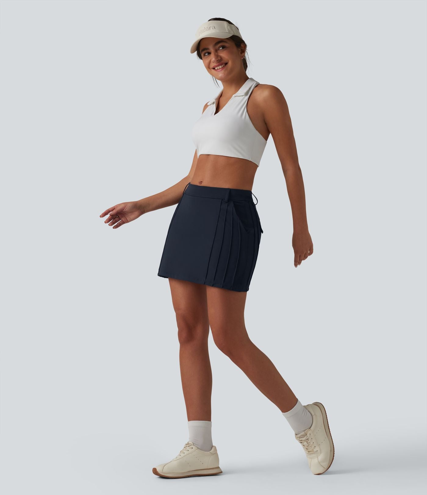 Jupe mini trapèze de golf 2-en-1 taille mi-haute avec poches