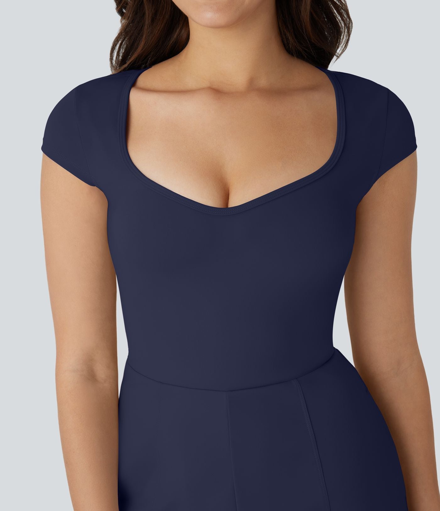 Combinaison de yoga Softlyzero™ Airy avec col U, manches courtes et poches latérales - Édition Easy Peasy