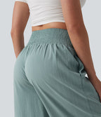 Pantalon baggy effet lin taille haute croisée avec détails froncés et poche