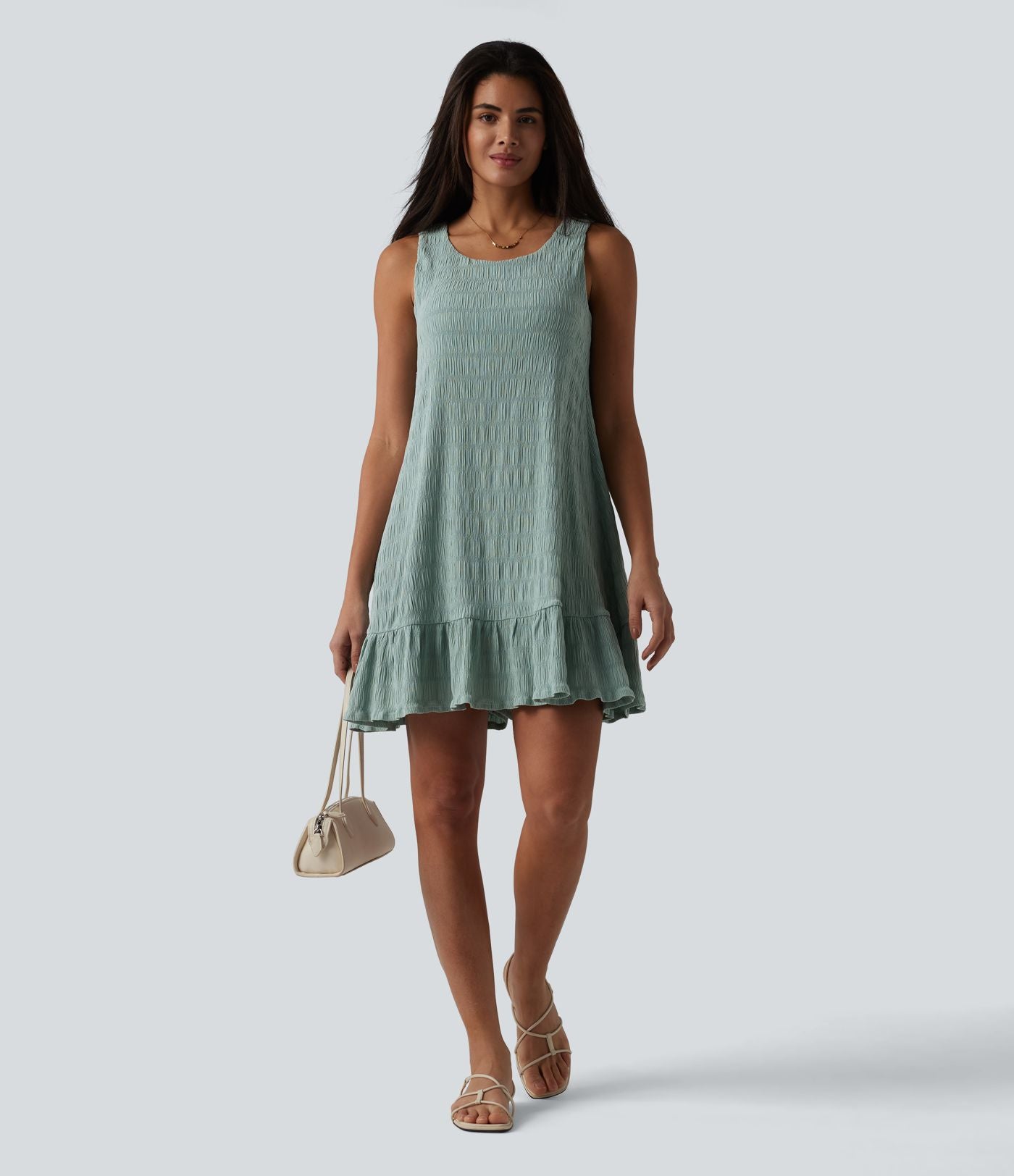 Robe courte décontractée sans manches à col rond, soutien-gorge intégré et ourlet à volants