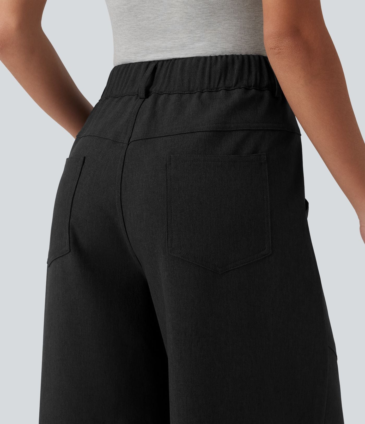 Pantalon tailleur ample taille mi-haute avec poches