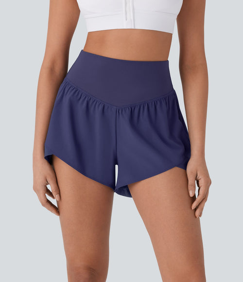 Breezeful™ Short yoga taille haute avec poche arrière ourlet croisé séchage rapide