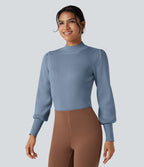Pull col montant manches bouffantes longues