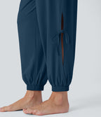 Combinaison de yoga col bateau sans manches dos nu avec découpes et poches latérales à cordon de serrage effet frais InstantCool, protection solaire UPF50+