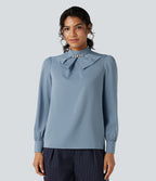 Chemise esprit bureau défroissage facile avec col lavallière, manches longues bouffantes et zip invisible au dos