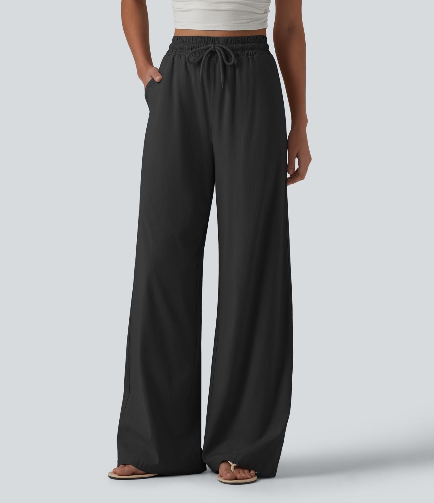 Pantalon large fluide en lin stretch taille haute avec cordon de serrage et poches