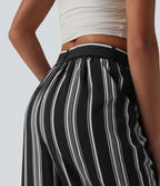 Pantalon large taille haute à rayures avec ceinture et poches
