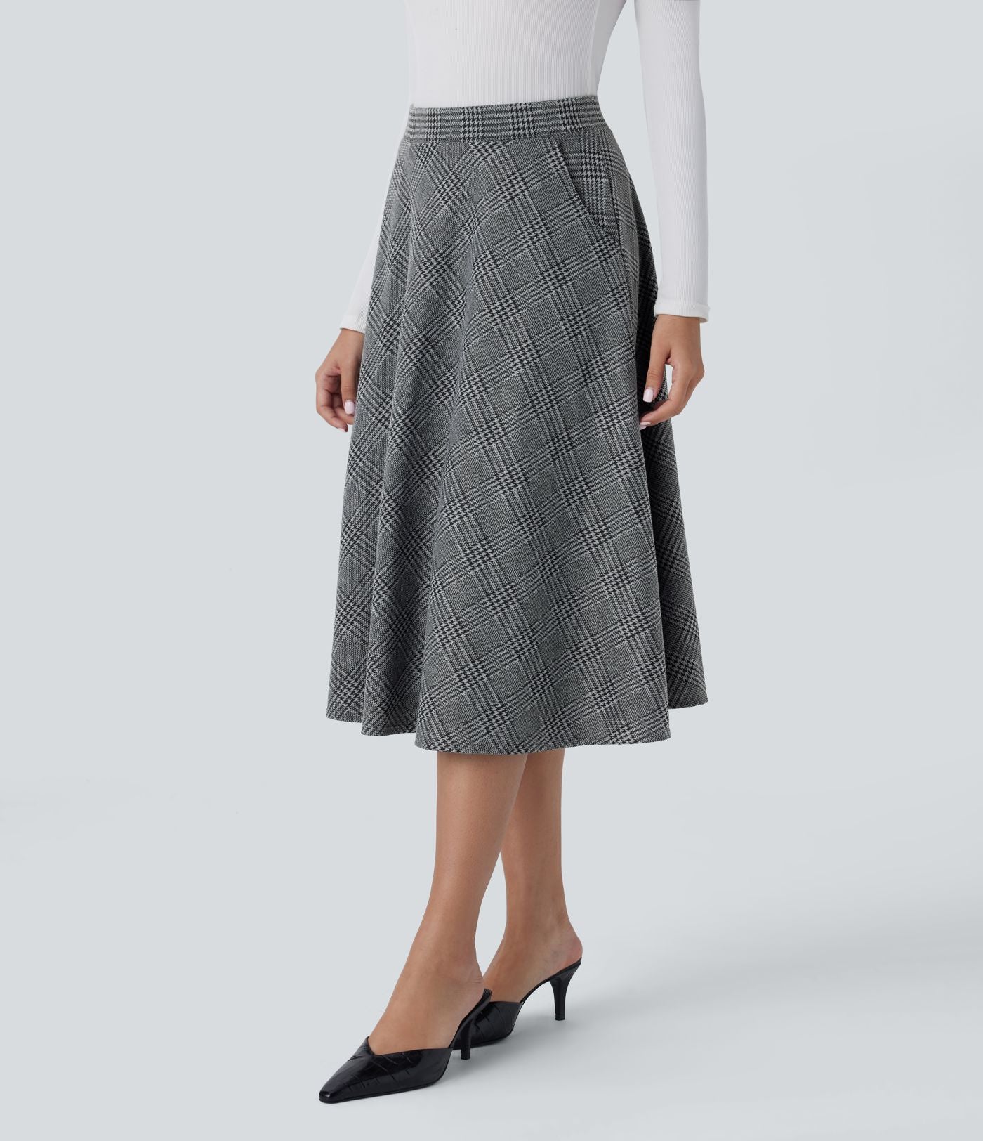 Jupe midi évasée à taille haute et poches latérales, motif pied-de-poule