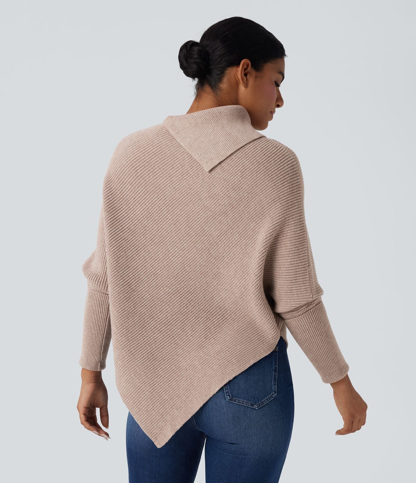 Pull cape décontracté col roulé manches chauve-souris ourlet asymétrique