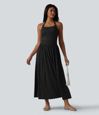 Robe longue fluide dos nu avec tour de cou, brassière intégrée et poches