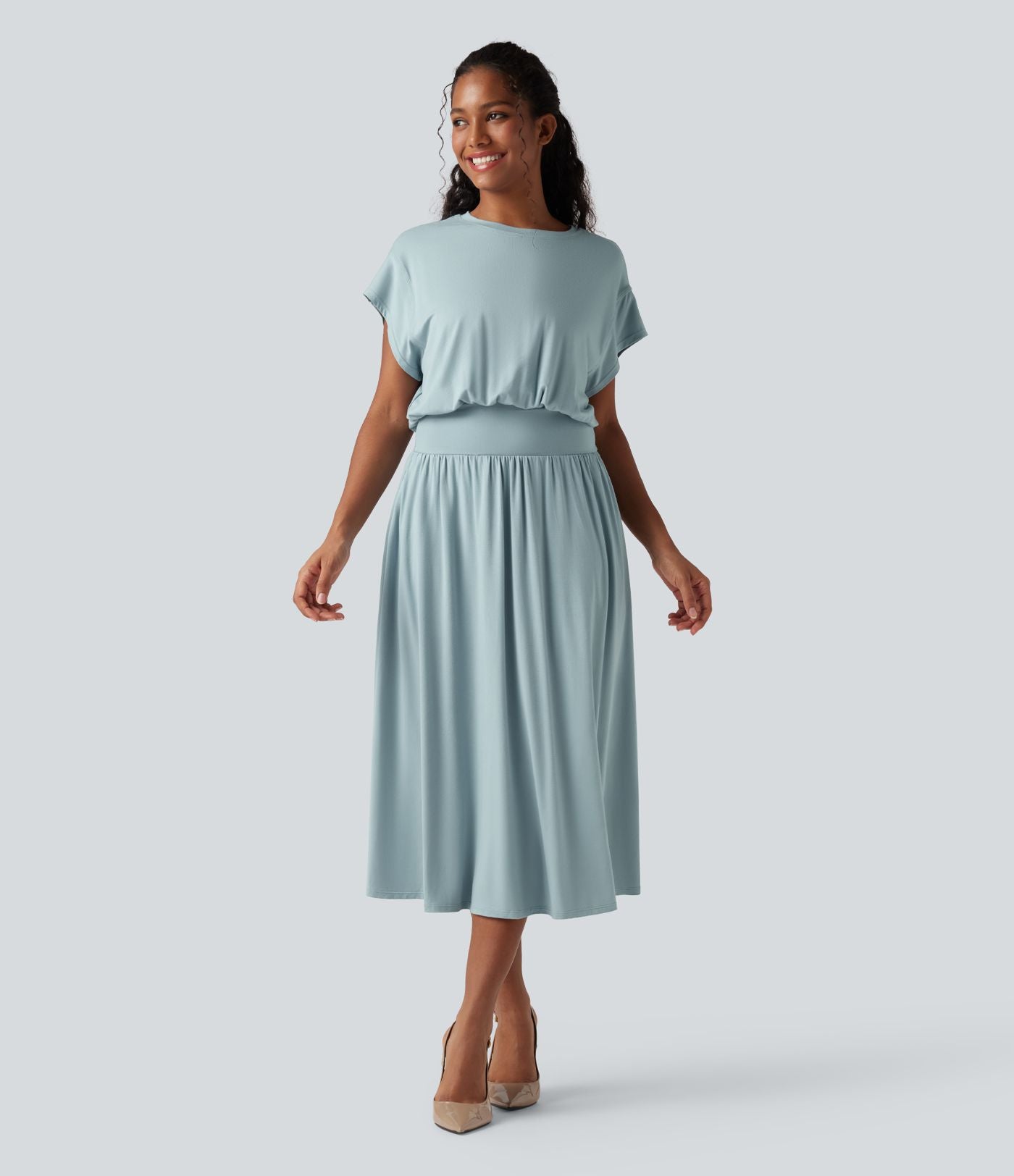 Robe de travail mi-longue fluide gainante à manches chauve-souris avec poches