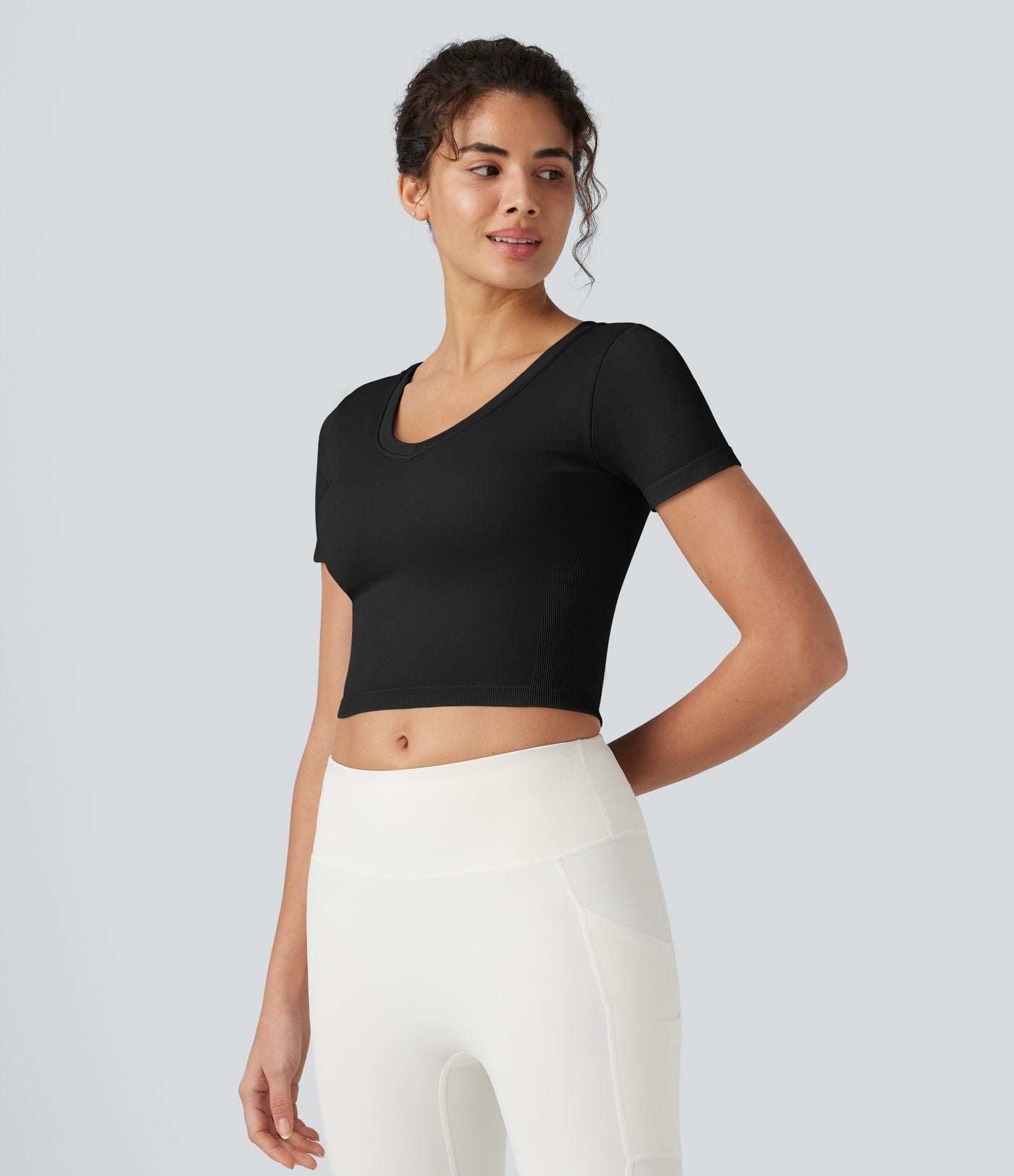 Haut de yoga court OneForm Seamless Flow col V à manches courtes avec brassière intégrée