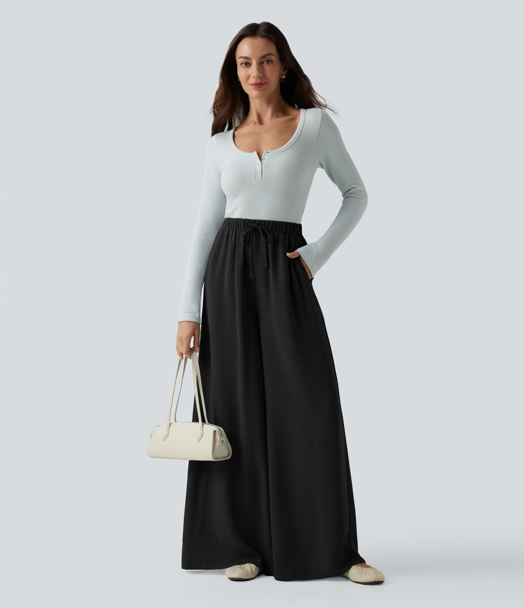 Pantalon large fluide décontracté taille haute effet lin avec cordon de serrage et poches