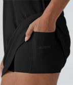 Robe de golf mini SoftlyZero™ Airy 2-en-1 à effet frais InstantCool color block avec poche pour tee de golf