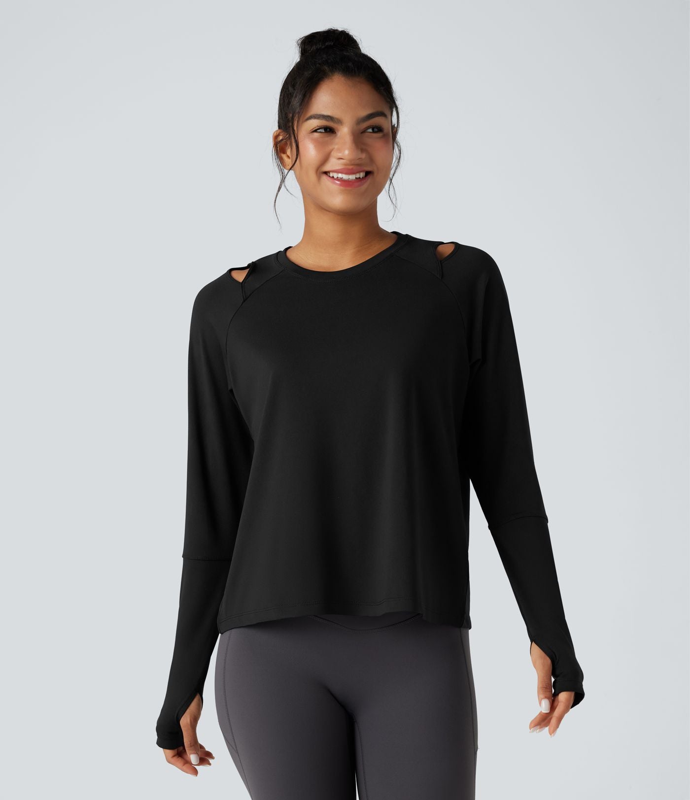 Top de sport running manches longues à découpes avec trous pouces