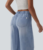 Jean large décontracté asymétrique en lyocell taille mi-haute drapé avec poches