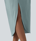 Robe midi col V manches chauve-souris ourlet tulipe torsadé