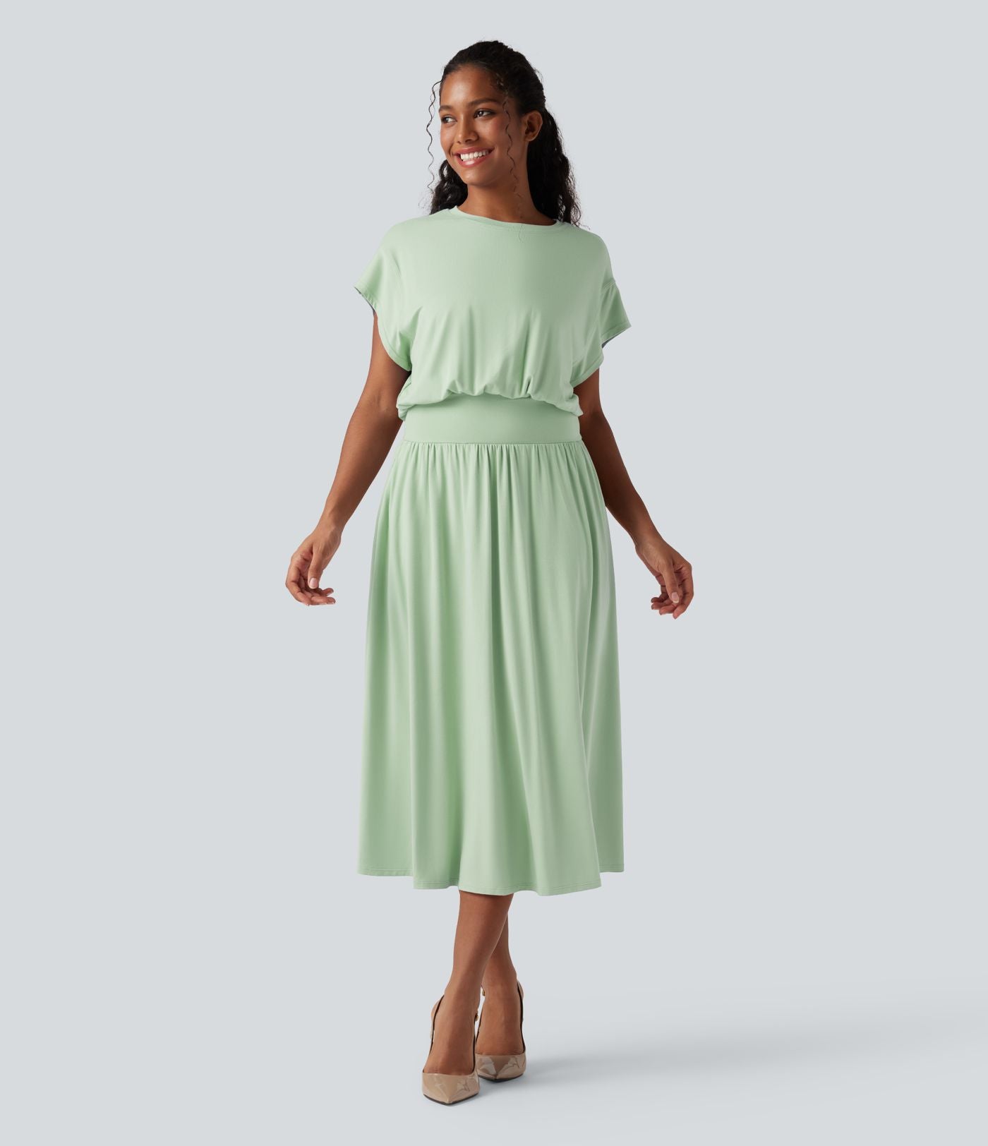 Robe de travail mi-longue fluide gainante à manches chauve-souris avec poches