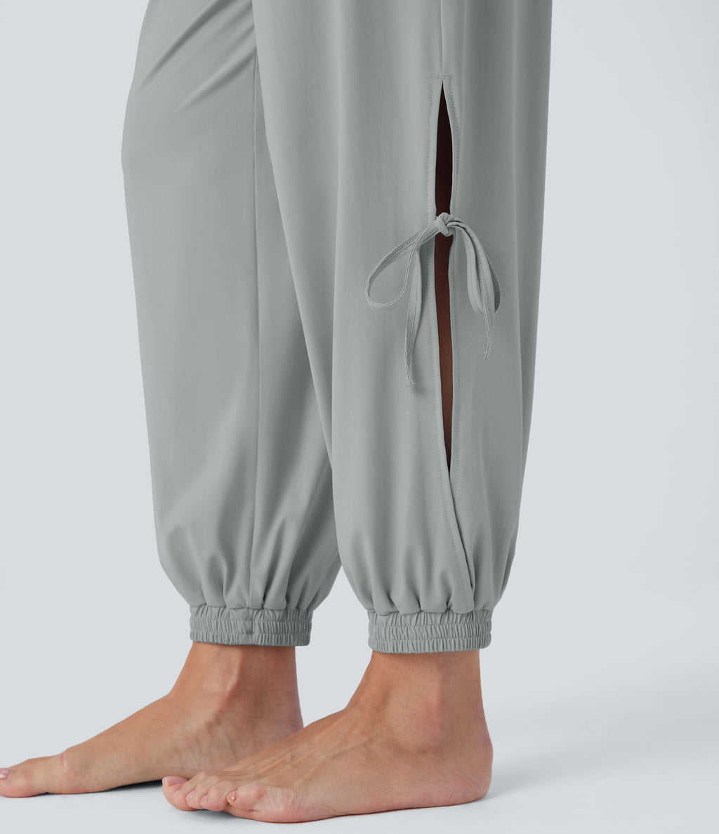 Combinaison de yoga col bateau sans manches dos nu avec découpes et poches latérales à cordon de serrage effet frais InstantCool, protection solaire UPF50+