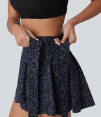 Jupe tennis mini fluide 2-en-1 taille haute imprimé léopard avec liens latéraux et poche