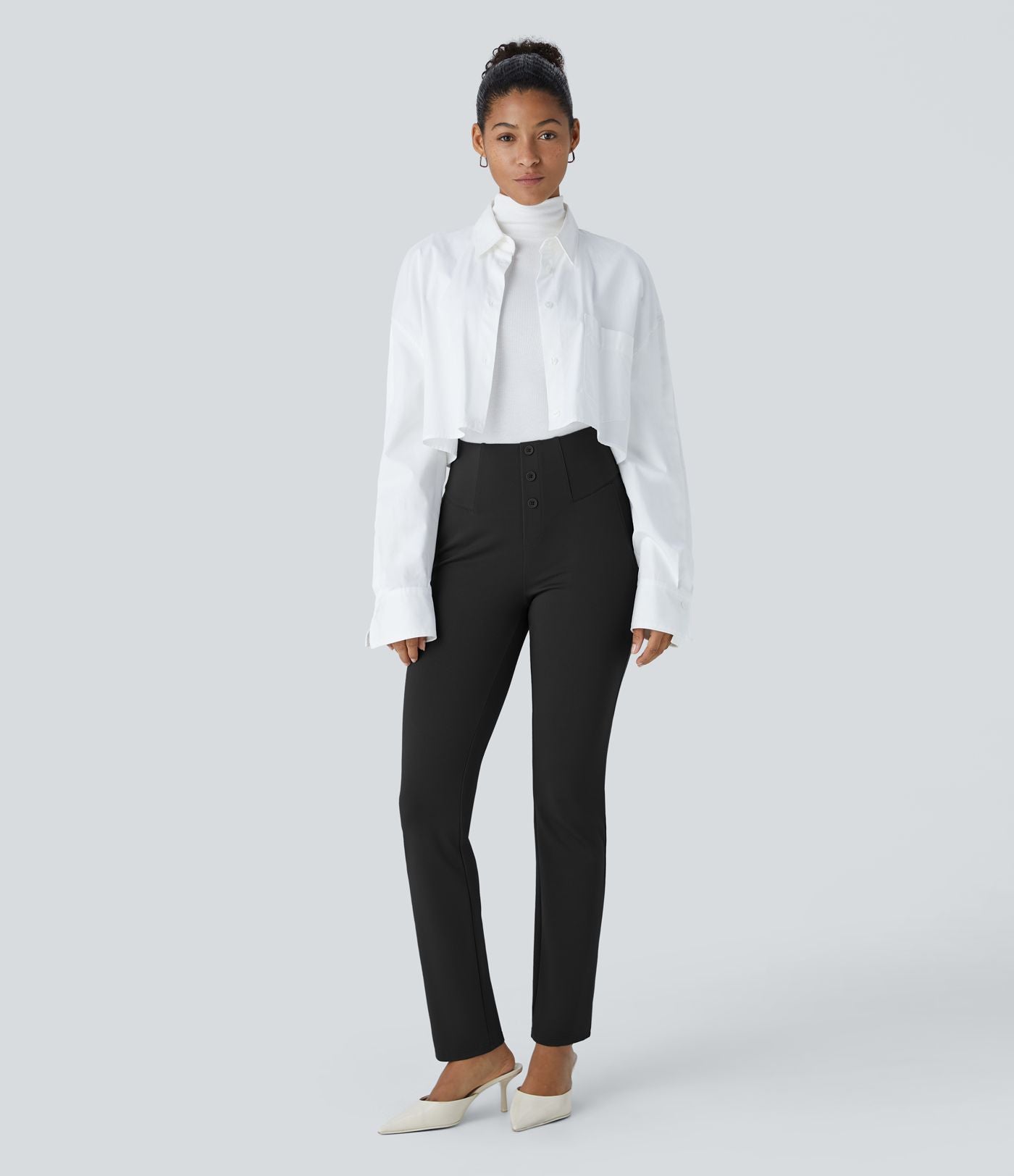 Pantalon ajusté taille haute avec poches décoratives