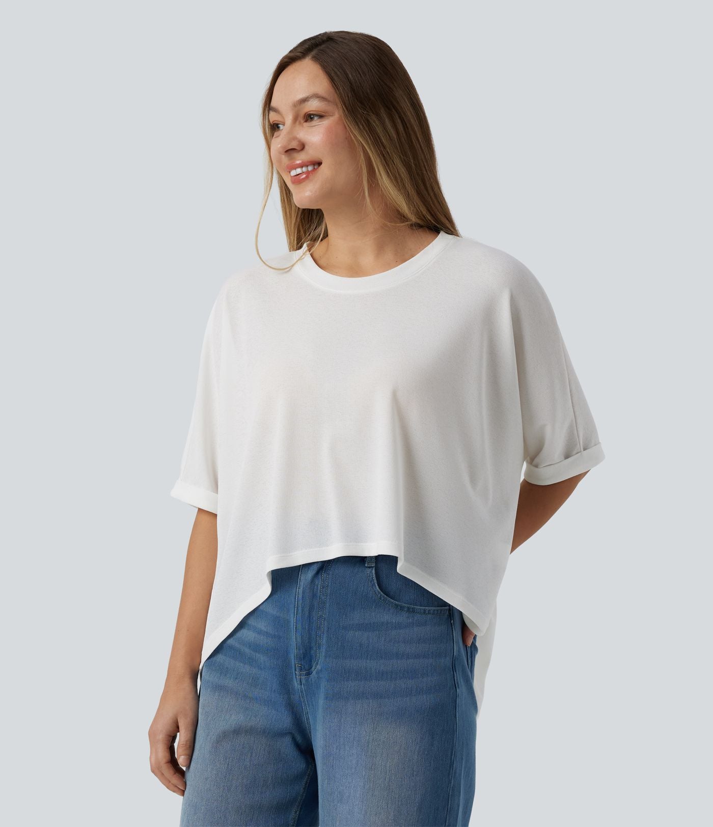T-shirt décontracté col rond manches mi-longues ourlet asymétrique