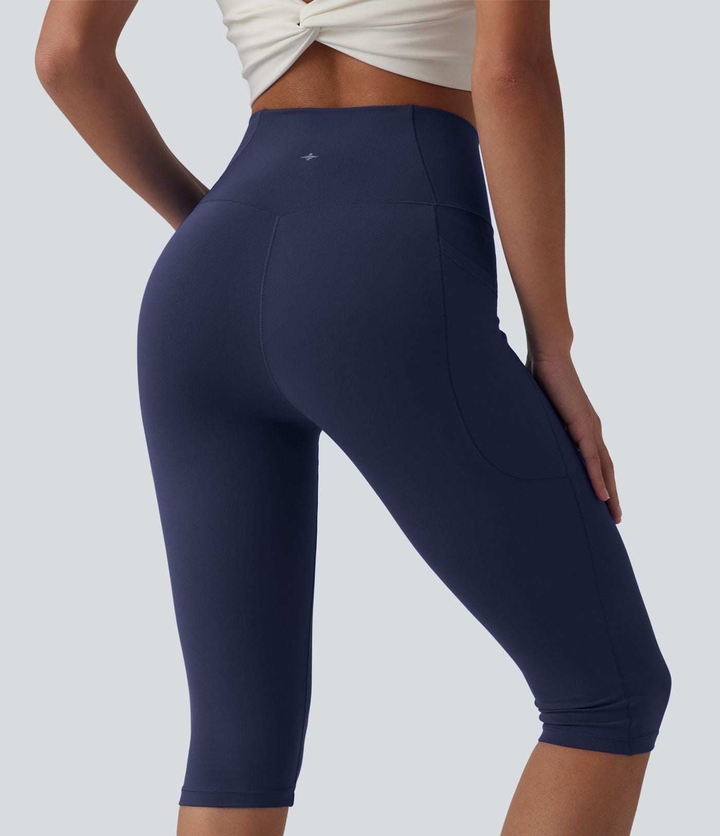 Legging de yoga corsaire SoftlyZero™ taille haute croisé avec poches - UPF50+