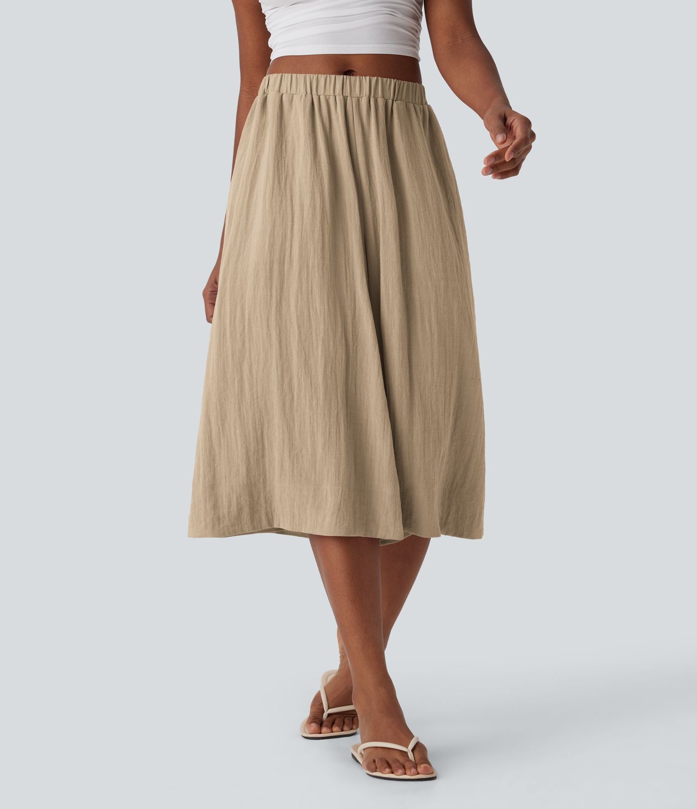 Pantalon fluide large taille mi-haute effet lin avec poche