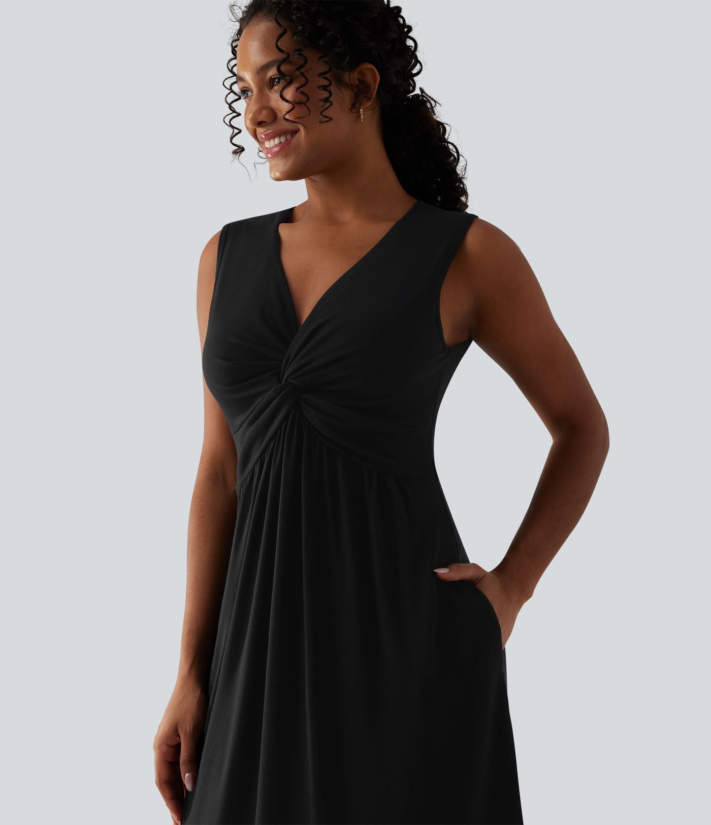 Robe midi évasée décontractée col V sans manches torsadée avec poches
