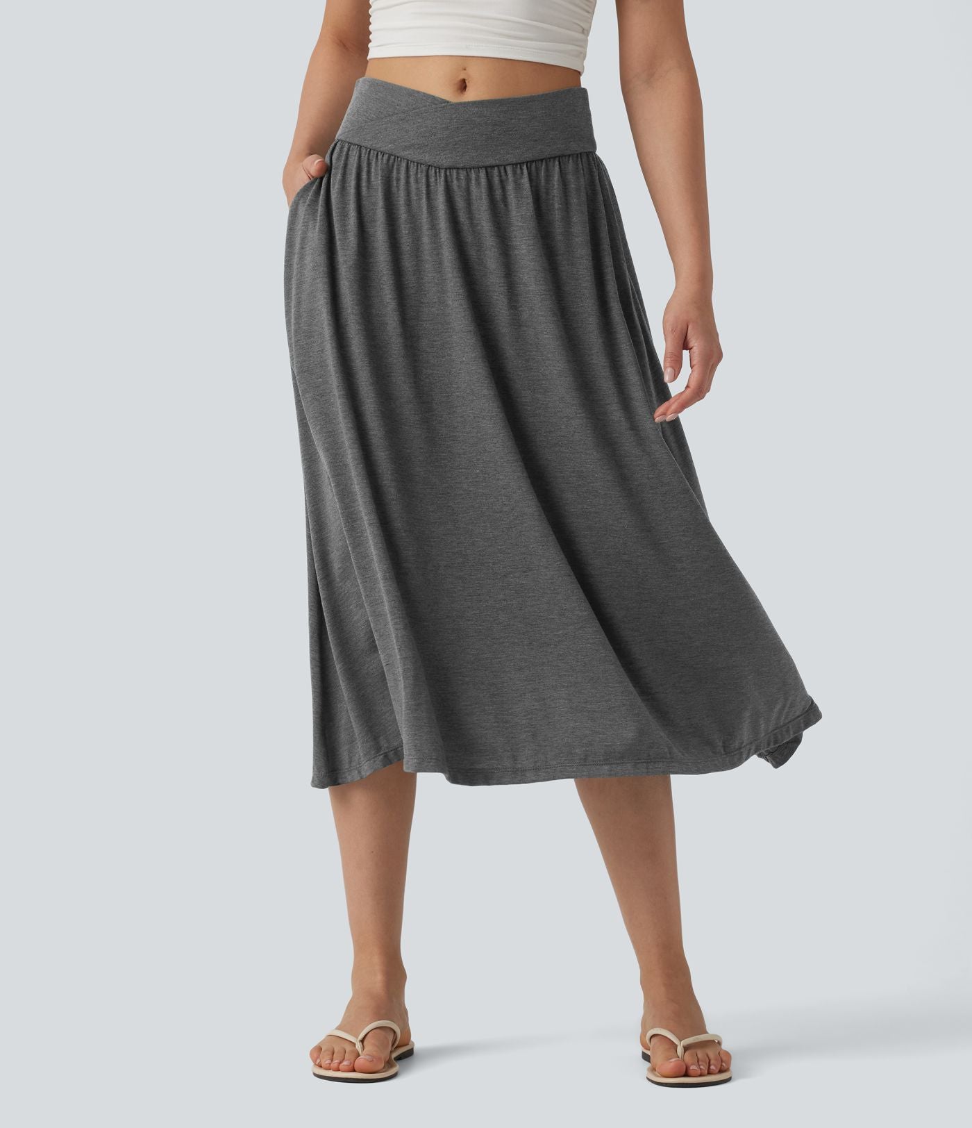 Jupe midi casual fluide croisée taille haute avec poches