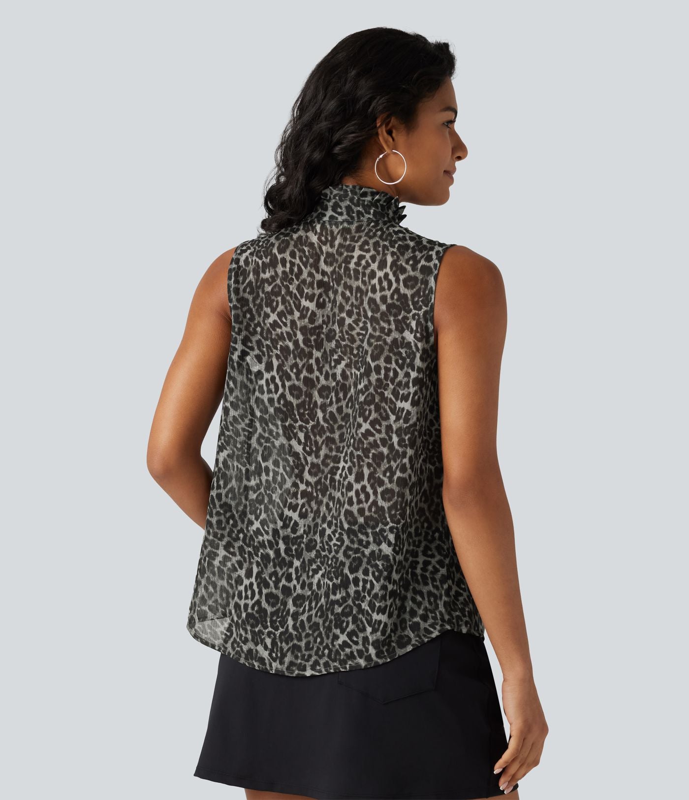 Blouse de travail en mousseline col cheminée avec nœud, sans manches, imprimé léopard